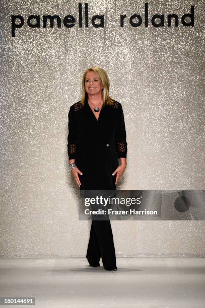 Designer Pamella Roland takes a bow on the runway at the Pamella Roland fashion show during Mercedes-Benz Fashion Week Spring 2014 on September 9,...