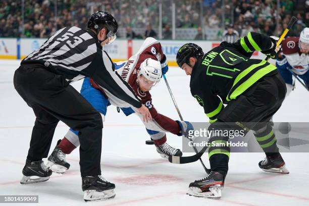 Nathan MacKinnon of the Colorado Avalanche and Jamie Benn of the Dallas Stars compete for the faceoff during the second period at American Airlines...