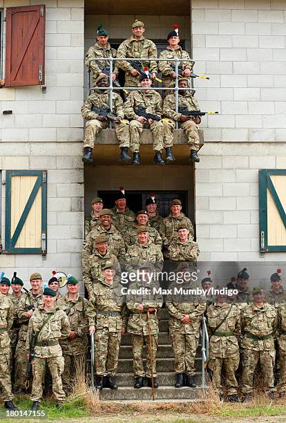 Prince Edward, Earl of Wessex, in his role as Royal Colonel, poses for a group photograph with Army Reservists from the London Regiment after...