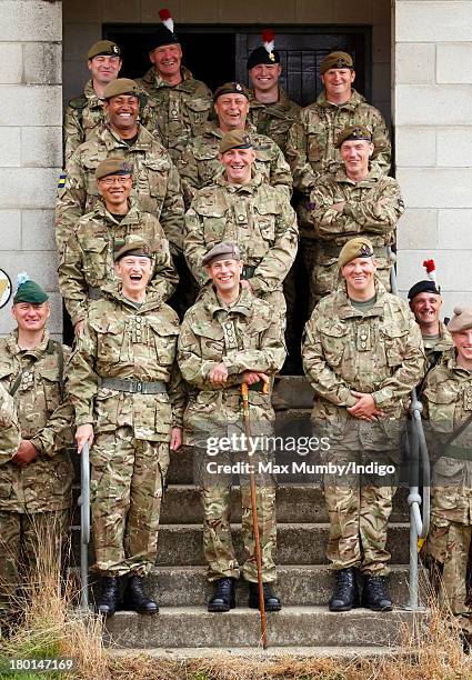 Prince Edward, Earl of Wessex, in his role as Royal Colonel, poses for a group photograph with Army Reservists from the London Regiment after...