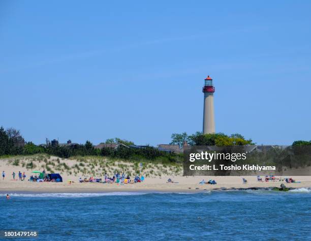beautiful beach at cape may, new jersey, and the cape may lighthouse - cape may 個照片及圖片檔