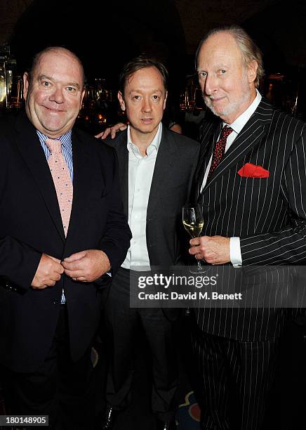 Paul McGuinness, Geordie Greig and Ed Victor attend the Tatler Bystander exhibition, featuring the 50 best party pictures of the past 50 years, at...