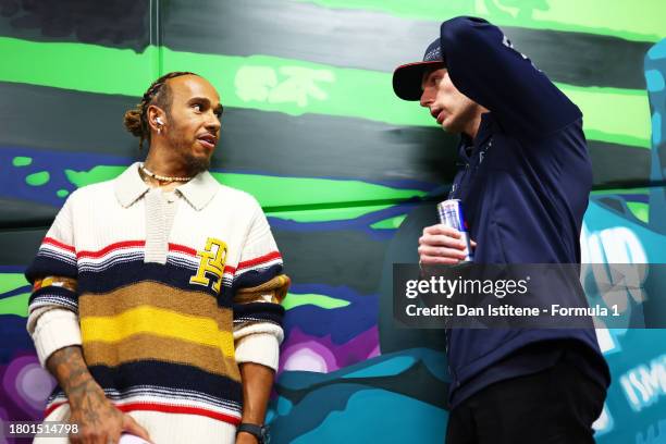Lewis Hamilton of Great Britain and Mercedes speaks to Max Verstappen of the Netherlands and Oracle Red Bull Racing prior to the F1 Grand Prix of Las...