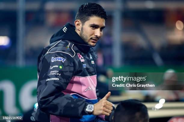 Esteban Ocon of France and Alpine F1 looks on from the drivers parade prior to the F1 Grand Prix of Las Vegas at Las Vegas Strip Circuit on November...