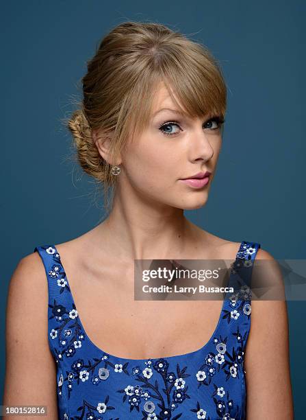 Actress Taylor Swift of 'One Chance' poses at the Guess Portrait Studio during 2013 Toronto International Film Festival on September 9, 2013 in...