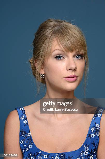 Actress Taylor Swift of 'One Chance' poses at the Guess Portrait Studio during 2013 Toronto International Film Festival on September 9, 2013 in...