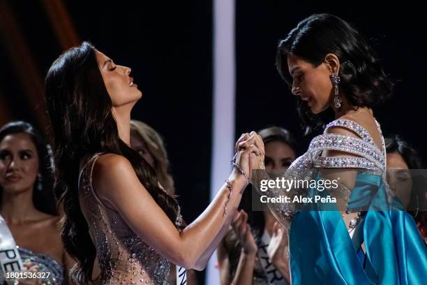 Miss Thailand Anntonia Porsild and Miss Nicaragua Sheynnis Palacios wait for the winner to be announced during the 72nd Miss Universe Competition at...