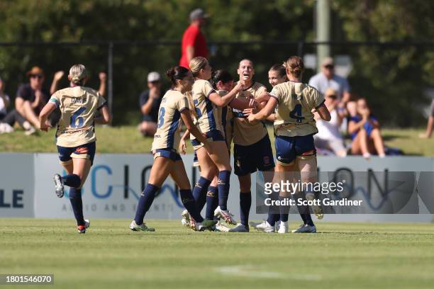 Emily Van Egmond of the Jets celebrates goal with team mates during the A-League Women round five match between Newcastle Jets and Melbourne City at...