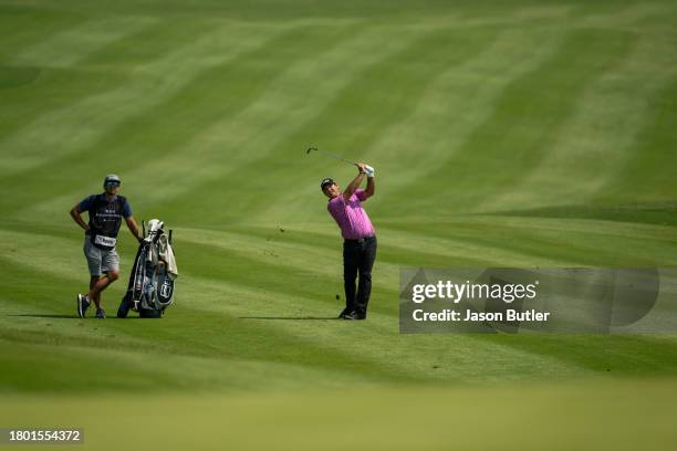 Patrick Reed of the United States plays his approach on hole 2 during the final round of the BNI Indonesian Masters presented by Tunas Niaga Energi...