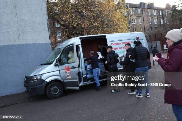 Hearts fan group Gorgie Ultras and the 'Big Hearts Foundation' receive donations to support the Forth 1 Cash for Kids appeal before a cinch...