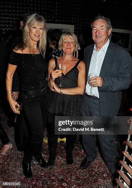 Annette Mason, Helen Atkinson-Wood and Nick Mason attend the Tatler Bystander exhibition, featuring the 50 best party pictures of the past 50 years,...