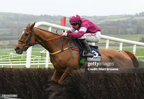 Kildare , Ireland - 25 November 2023; Idas Boy, with Sam Ewing up, jumps the last on their way to winning the Ryans Cleaning Handicap Steeplechase on...