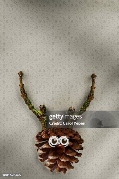 reindeer christmas figurine made of wooden sticks and berries - models in stockings stock pictures, royalty-free photos & images