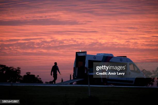 Ramp extends from an ambulance as preparations are made at Sheba Medical Center for the expected arrival of hostages to be released by Hamas on...