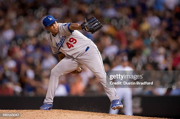 Carlos Marmol of the Los Angeles Dodgers pitches in the seventh inning of a game against the Colorado Rockies at Coors Field on September 4, 2013 in...