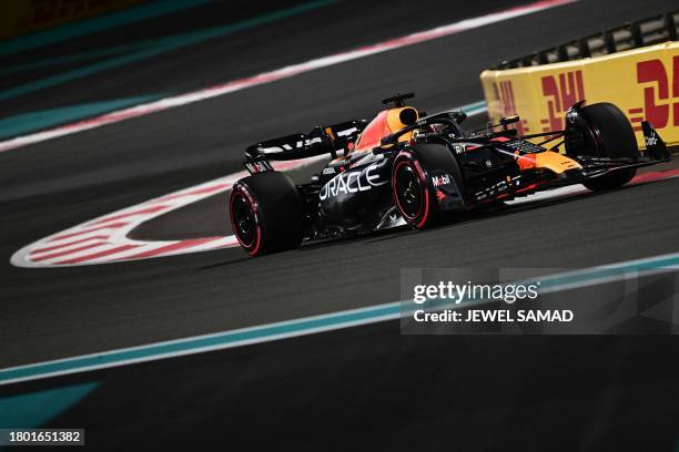 Red Bull Racing's Dutch driver Max Verstappen drives during the qualifying session for the Abu Dhabi Formula One Grand Prix at the Yas Marina Circuit...