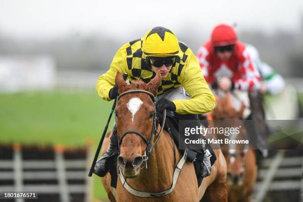 Kildare , Ireland - 25 November 2023; State Man, with Paul Townend up, on their way to winning the Unibet Morgiana Hurdle after jumping the last on...