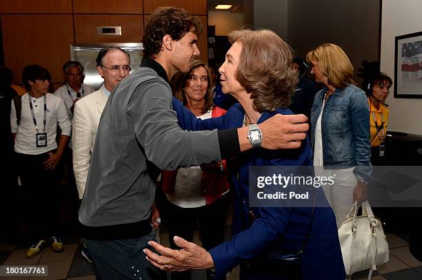 Rafael Nadal of Spain greets Queen Sofia of Spain after winning the men's singles final match against Novak Djokovic of Serbia on Day Fifteen of the...