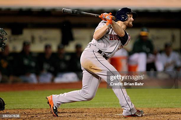 Trevor Crowe of the Houston Astros flies out against the Oakland Athletics in the fourth inning at O.co Coliseum on September 6, 2013 in Oakland,...