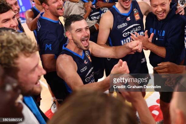 Chris Goulding of United celebrates victory with his teammates in the round eight NBL match between Melbourne United and Sydney Kings at John Cain...