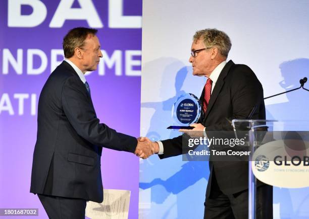 Honoree Bobby Farrelly and John C. McGinley onstage during the Global Down Syndrome Foundation's 15th Annual Be Beautiful Be Yourself Fashion Show at...