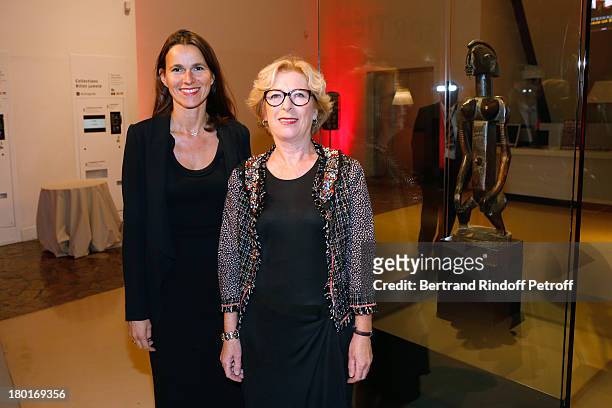 Minister of Higher Education and Research Genevieve Fioraso and Minister of Culture and Communication Aurelie Filippetti front of Dogon feminine...