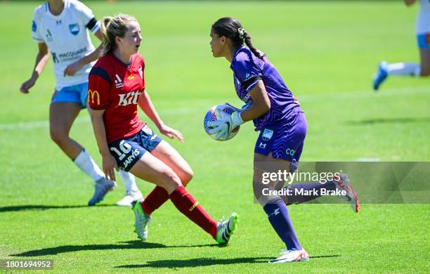 Jada Whyman goalkeeper of Sydney FC saves in front of Dylan Holmes of Adelaide United during the A-League Women round five match between Adelaide...