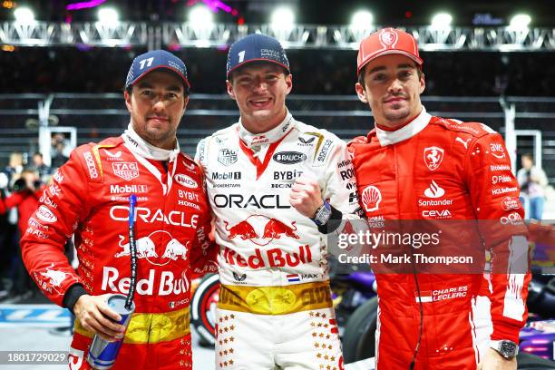 Race winner Max Verstappen of the Netherlands and Oracle Red Bull Racing, Second placed Charles Leclerc of Monaco and Ferrari and Third placed Sergio...