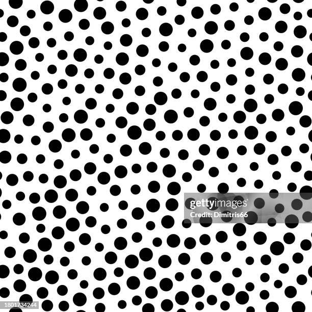 black dots on white background seamless pattern - polka-dot stock illustrations