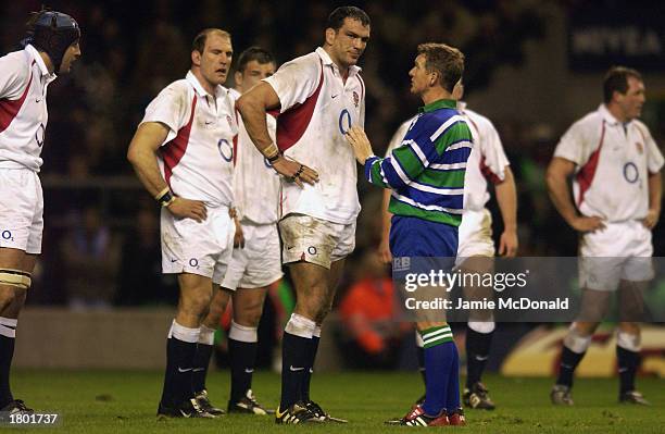 Referee Paul Honiss of New Zealand lectures Martin Johnson of England during the RBS Six Nations International match between England and France on...