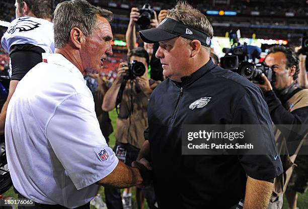 Head coach Mike Shanahan of the Washington Redskins and head coach Chip Kelly of the Philadelphia Eagles shake hands after an NFL game at FedExField...