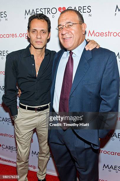 Marc Anthony and Maestro Cares Foundation founder Henry Cardenas attend 2nd Annual Maestro Cares Chicago Fundraiser at Y-Bar on September 9, 2013 in...