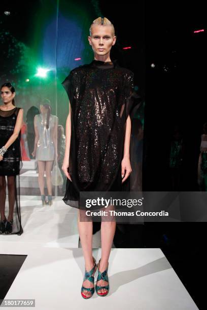 Model poses at the CZAR by Cesar Galindo Spring 2014 Presentation during Mercedes-Benz Fashion Week at The Box in Lincoln Center in New York City on...