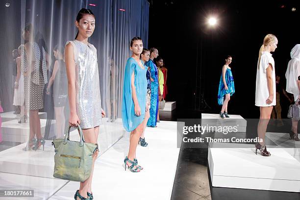 Models pose at the CZAR by Cesar Galindo Spring 2014 Presentation during Mercedes-Benz Fashion Week at The Box in Lincoln Center in New York City on...