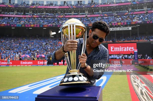 Sachin Tendulkar carries the ICC Men's Cricket World Cup Trophy ahead of the ICC Men's Cricket World Cup India 2023 Final between India and Australia...