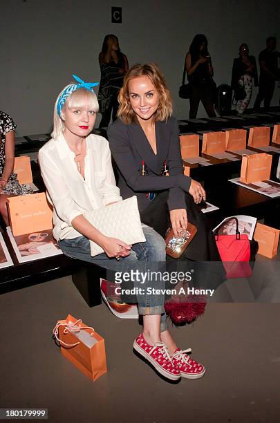Fiona Byrne and Kelly Framel attend the Karen Walker show during Spring 2014 Mercedes-Benz Fashion Week>> at Pier 59 Studios on September 9, 2013 in...
