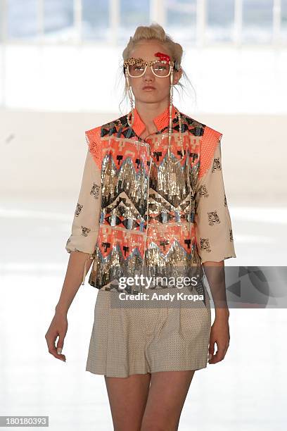 Model walks the runway at the Love By Diego Binetti fashion show during Mercedes-Benz Fashion Week Spring 2014 at The Designer's Loft at Studio 450...