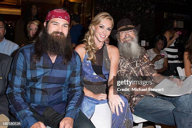 Personalities Jep Robertson, Jessica Robertson and Silas Merritt "Si" Robertson attend the Evening By Sherri Hill Spring 2014 show at Trump Tower on...