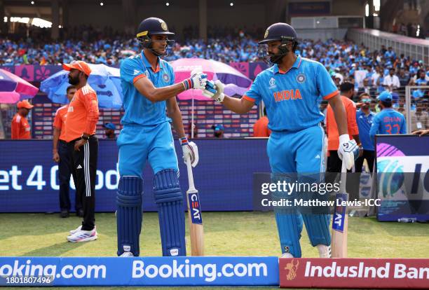 Shubman Gill and Rohit Sharma of India make their way out to bat during the ICC Men's Cricket World Cup India 2023 Final between India and Australia...