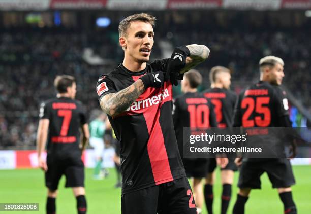 November 2023, Bremen: Soccer, Bundesliga, SV Werder Bremen - Bayer 04 Leverkusen, Matchday 12, wohninvest Weserstadion. Leverkusen's Alejandro...