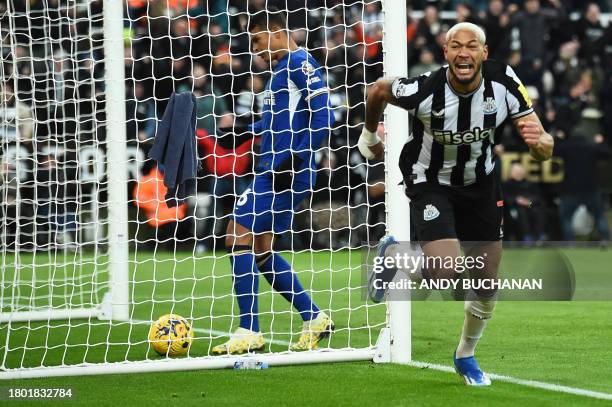 Newcastle United's Brazilian striker Joelinton celebrates scoring the team's third goal during the English Premier League football match between...