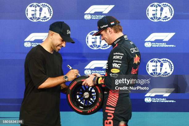 Sergio Aguero Max Verstappen of Red Bull Racing after qualifying ahead of the Formula 1 Abu Dhabi Grand Prix at Yas Marina Circuit in Abu Dhabi,...