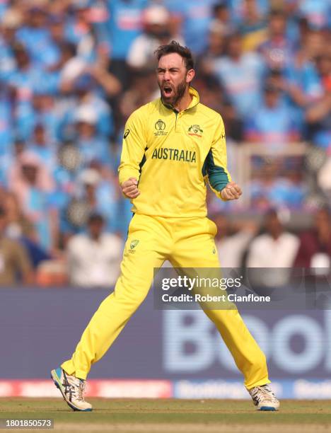 Glenn Maxwell of Australia celebrates the wicket of Rohit Sharma of India during the ICC Men's Cricket World Cup India 2023 Final between India and...