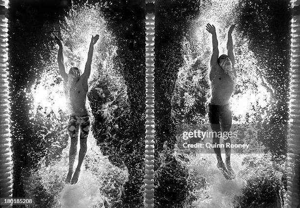 Nikola Dimitrov of Bulgaria and Alpkan Ornek of Turkey compete during the Swimming Men's 400m Individual Medley heat 1 on day sixteen of the 15th...