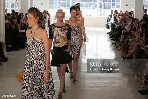 Models walk the runway at the Love By Diego Binetti fashion show during Mercedes-Benz Fashion Week Spring 2014 at The Designer's Loft at Studio 450...