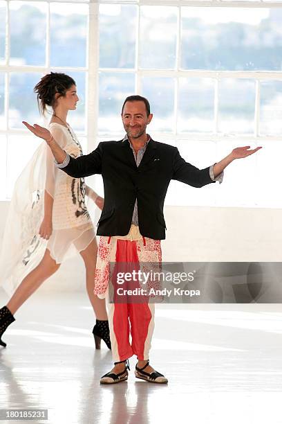 Fashion designer Diego Binetti walks the runway at the Love By Diego Binetti fashion show during Mercedes-Benz Fashion Week Spring 2014 at The...