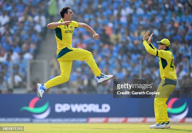 Pat Cummins of Australia celebrates the wicket of Shreyas Iyer of India during the ICC Men's Cricket World Cup India 2023 Final between India and...