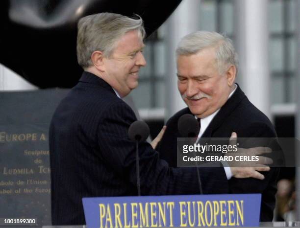 Former Polish president and guest of honour, Lech Walesa is received on the podium by the President of the European Parliament Pat Cox during a...