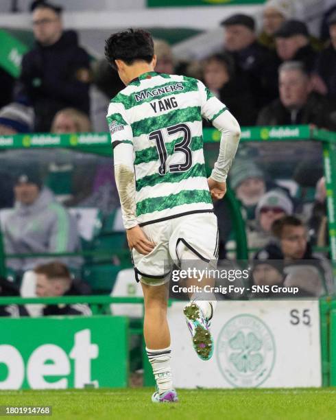 Celtic's Yang Hyun-Jun holds his hamstring before being substituted off during a cinch Premiership match between Celtic and Motherwell at Celtic...