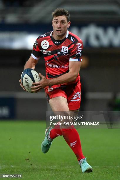 Oyonnax' French full-back Maxime Salles runs with the ball during the French Top14 rugby union match between Montpellier Herault Rugby and Union...